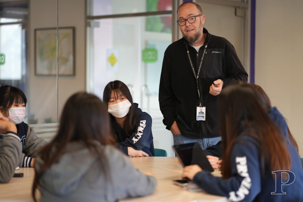 Teacher with students